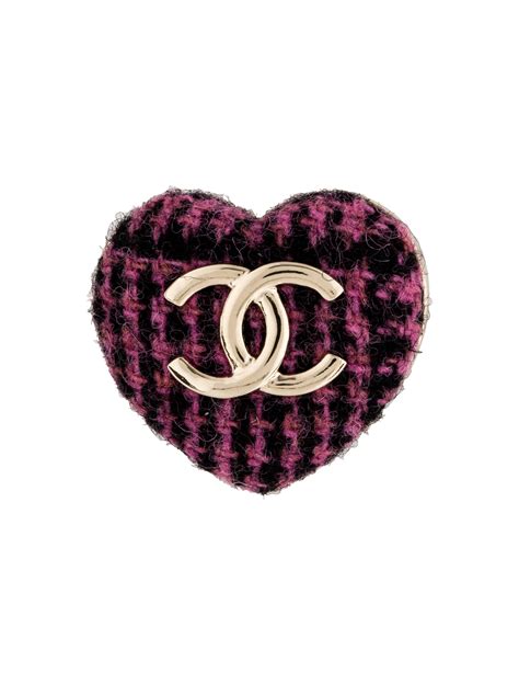 chanel peace sign brooch|real real Chanel brooch.